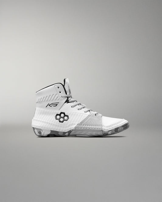 White wrestling shoe with brand logo on a gray background