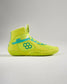 Bright yellow wrestling shoes with turquoise accents and a unique design ideal for performance in the sport