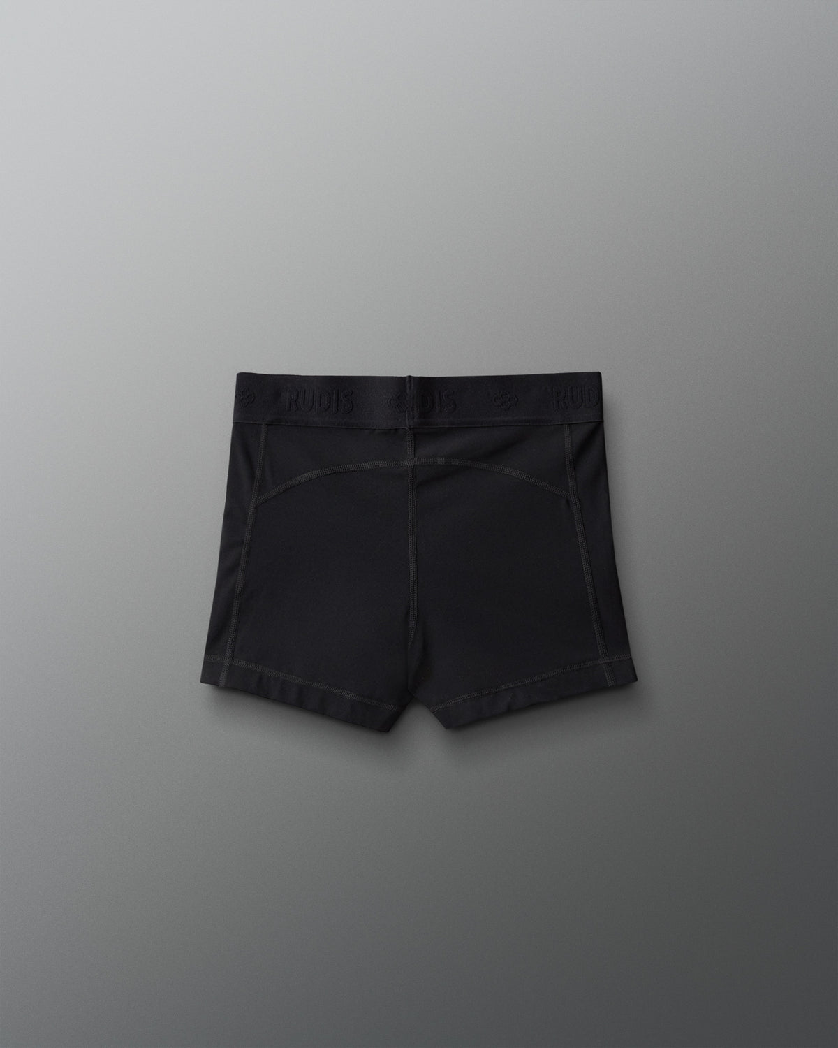 Black shorts on a gray background