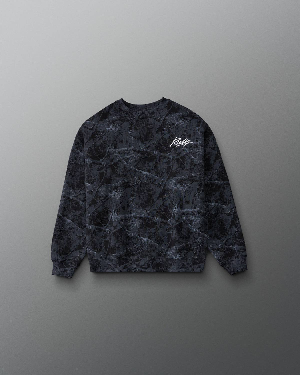 RUDIS Wrestling Youth Relaxed Comfort Fleece Crewneck in Black Camo, front view with dark woodland camouflage pattern and white RUDIS script chest logo.