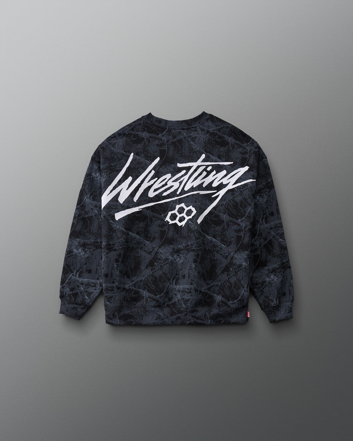 RUDIS Wrestling Youth Relaxed Comfort Fleece Crewneck in Black Camo, back view featuring bold white Wrestling script graphic and RUDIS hex logo over camouflage print.