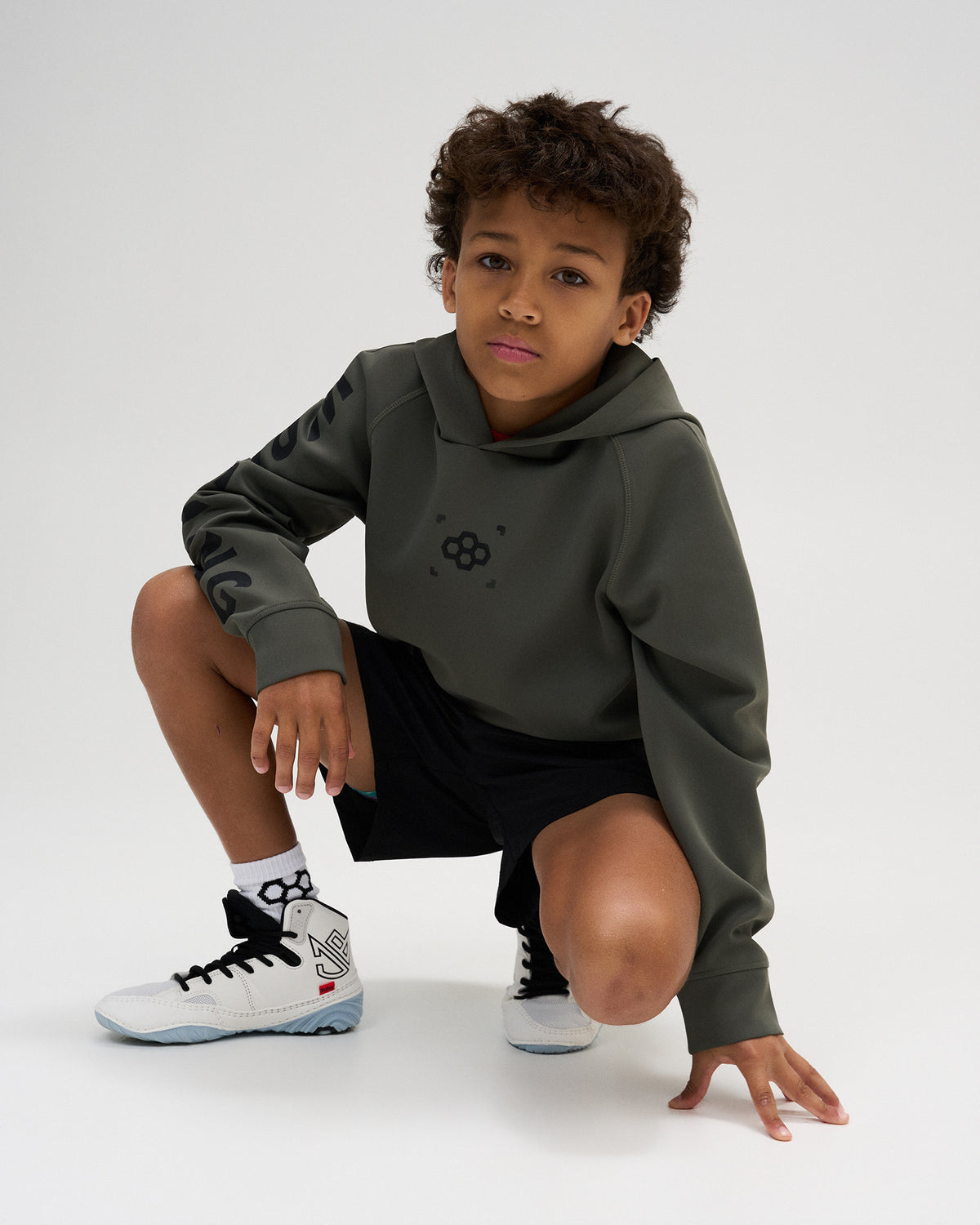 RUDIS Wrestling Youth COOL FEEL Hoodie in Dark Olive, featuring tonal black RUDIS chest branding and bold WRESTLING sleeve graphics.
