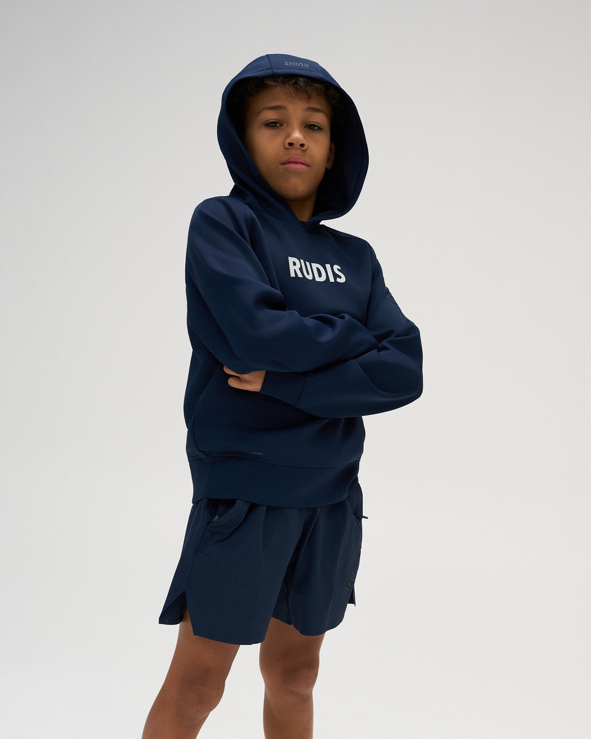 RUDIS Contrast Youth COOL-FEEL Hoodie in Navy, featuring contrasting white RUDIS chest branding and a clean athletic silhouette.