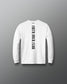 A white long-sleeve t-shirt with 'FAITH OVER FEAR' printed vertically in black on the back, displayed against a dark gray gradient background.