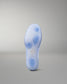 Blue wrestling shoe sole with a RUDIS brand logo on a gray background