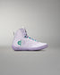 White high-top sneaker with a green logo on a gray background