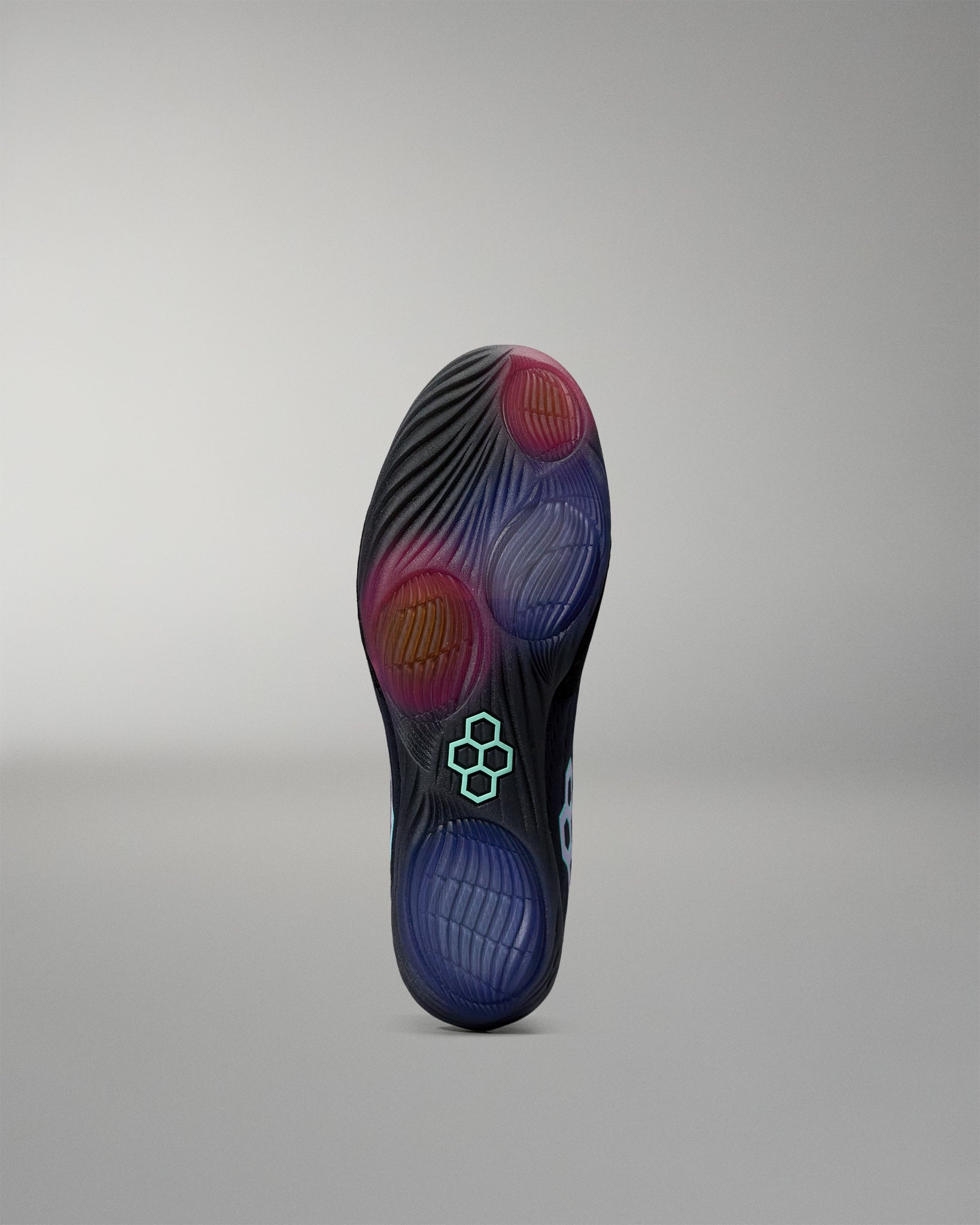 Cushioned shoe sole with a brand logo on a gray background