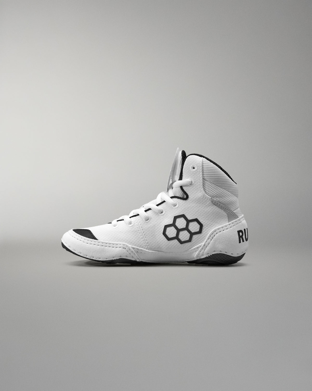 White Wrestling Shoe with black accents on a gray background