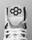 White Wrestling Shoe with black hexagonal logo on a gray background
