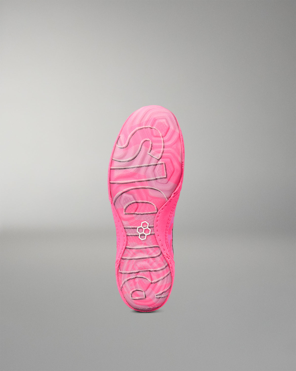 A bright pink Wrestling shoe sole with the brand name 'RUDIS' and a small circular logo embossed in the center, shown against a neutral gray gradient background.