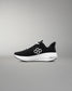 Black and white running shoe on a gray background