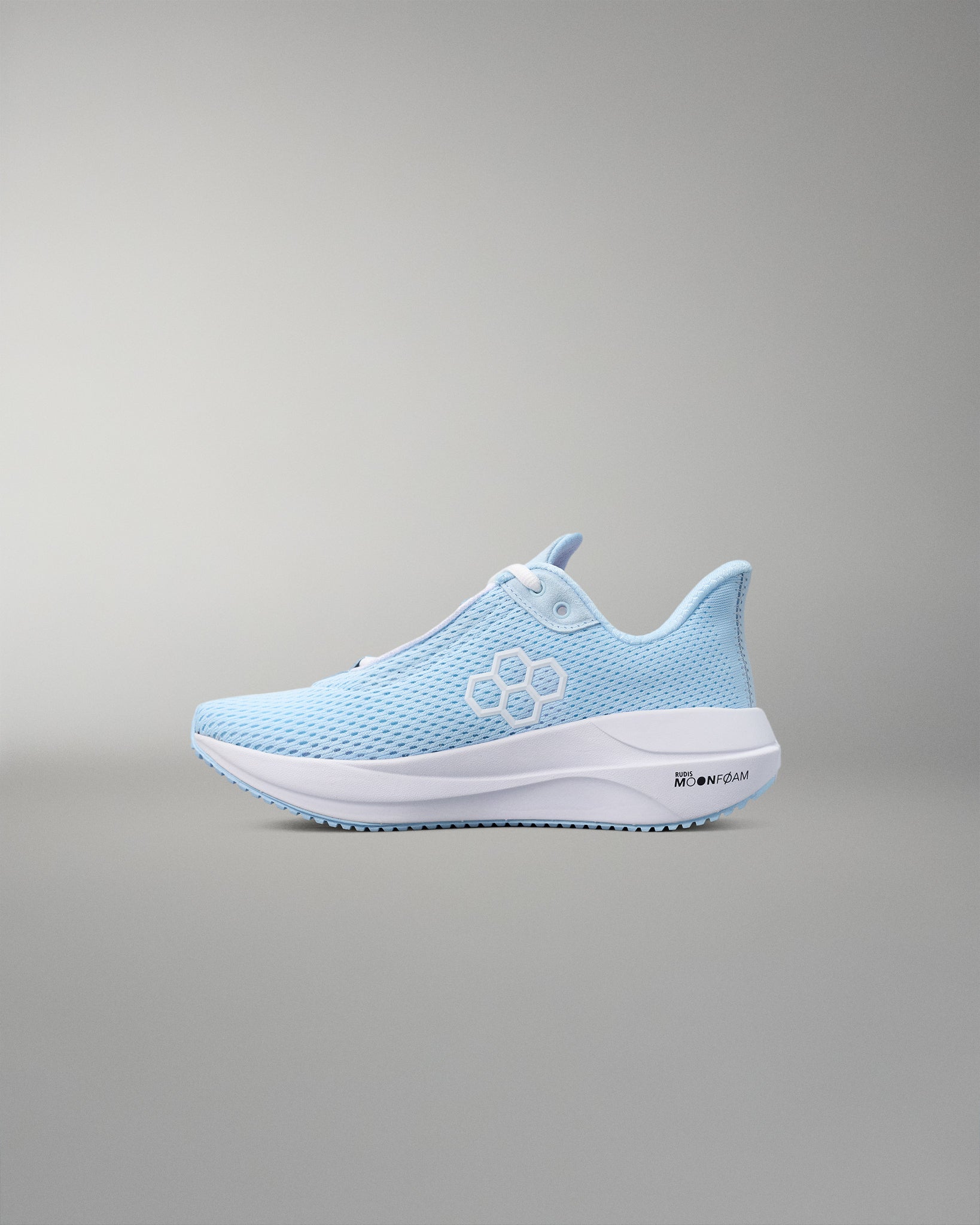 Light blue running shoe with white sole on a gray background