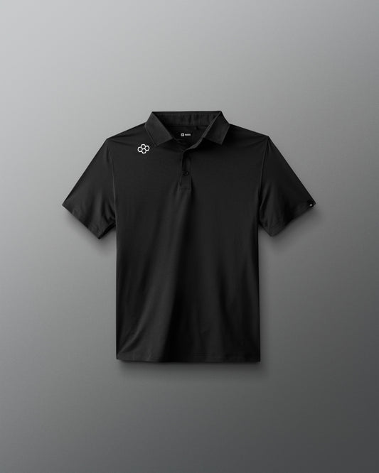 Black polo shirt with a logo on a gray background