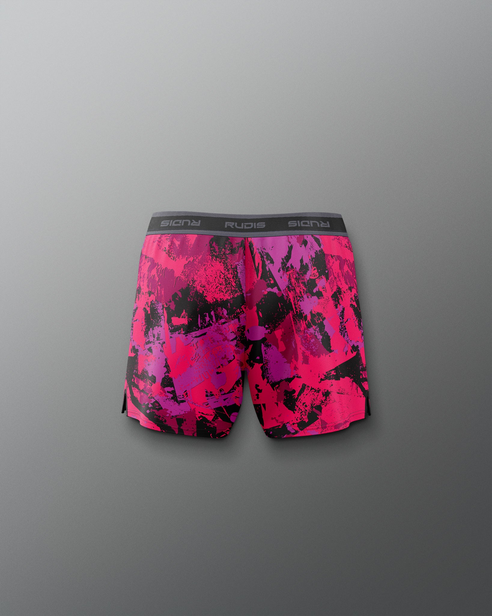 Pink and black patterned boxer briefs on a gray background