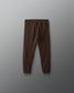 Brown pants on a gray background