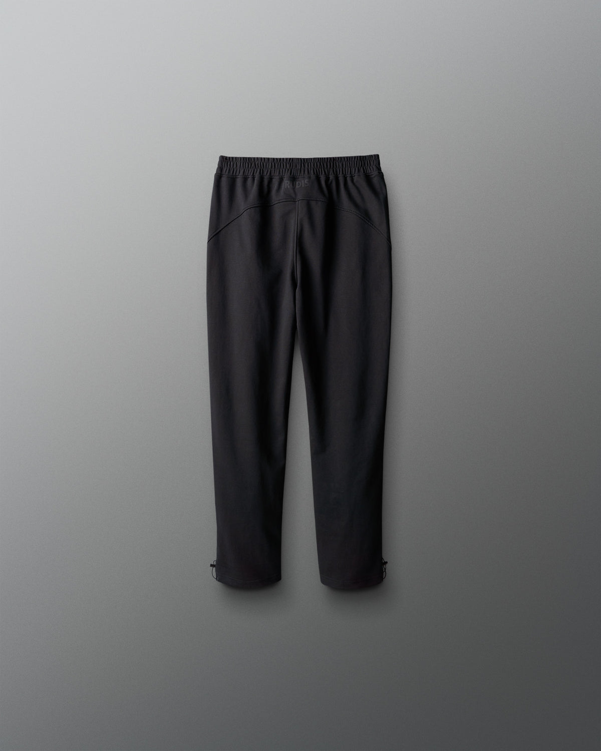 Black pants on a gray background