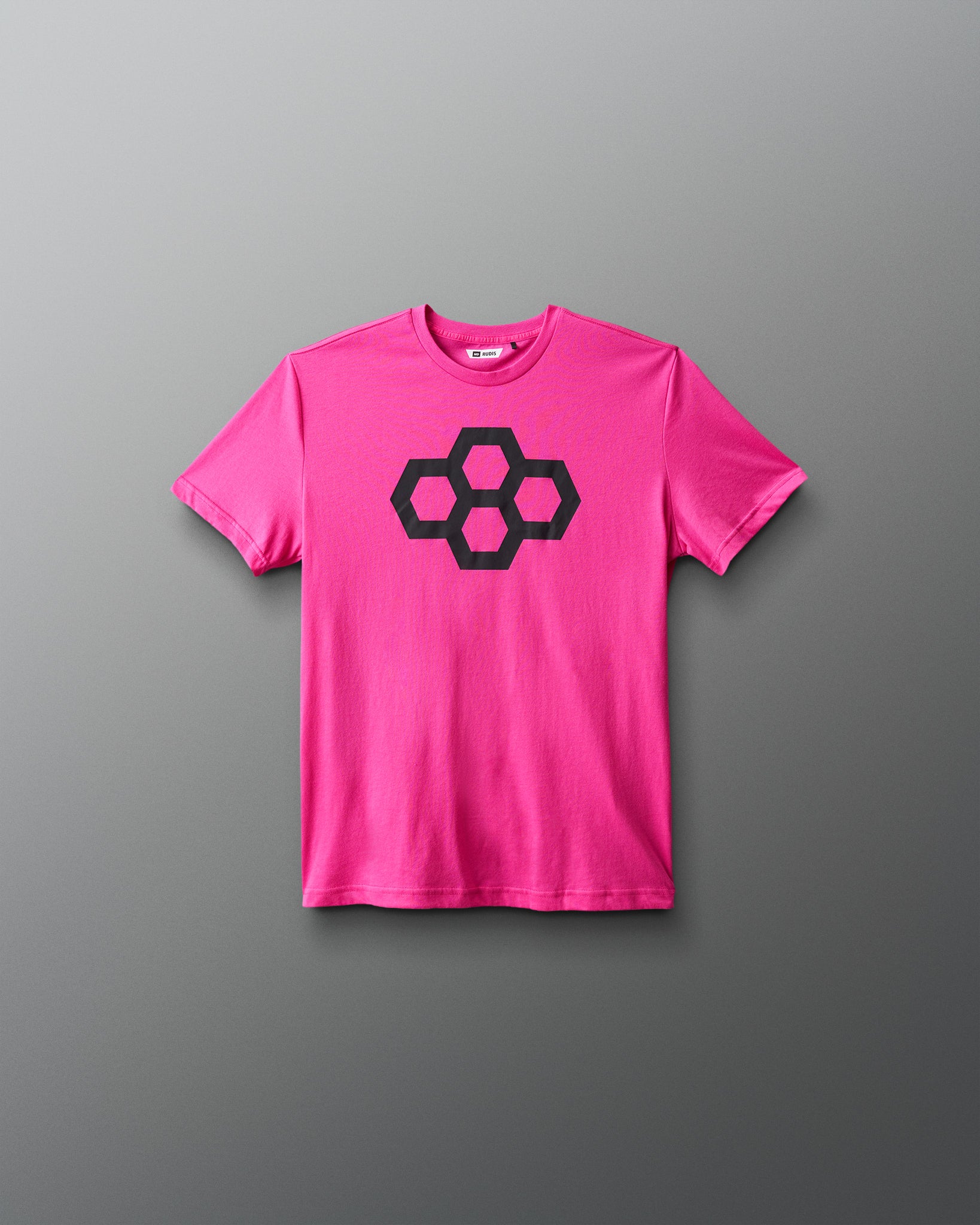 Pink t-shirt with a black quadhex logo on a gray background