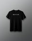 Front view of a black T-shirt with the word ‘Wrestling’ printed in bold white gothic-style font across the chest.