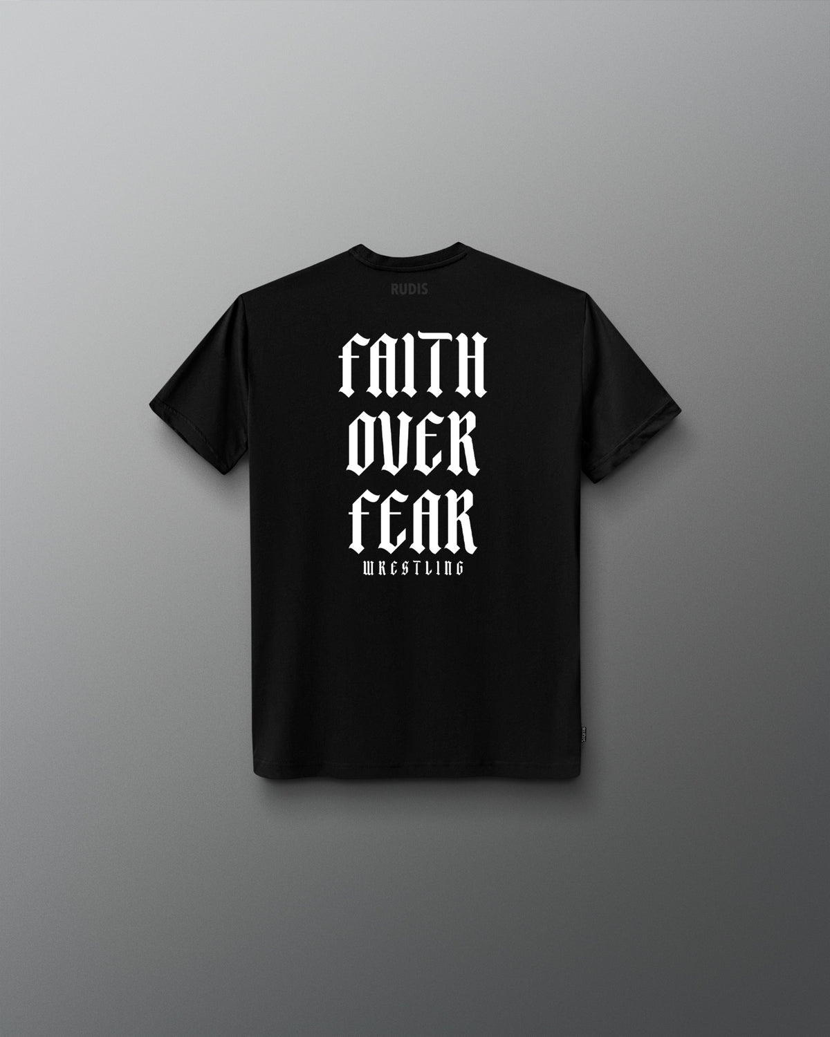 Back view of a black T-shirt featuring bold white gothic-style text that reads ‘Faith Over Fear Wrestling’ stacked vertically.