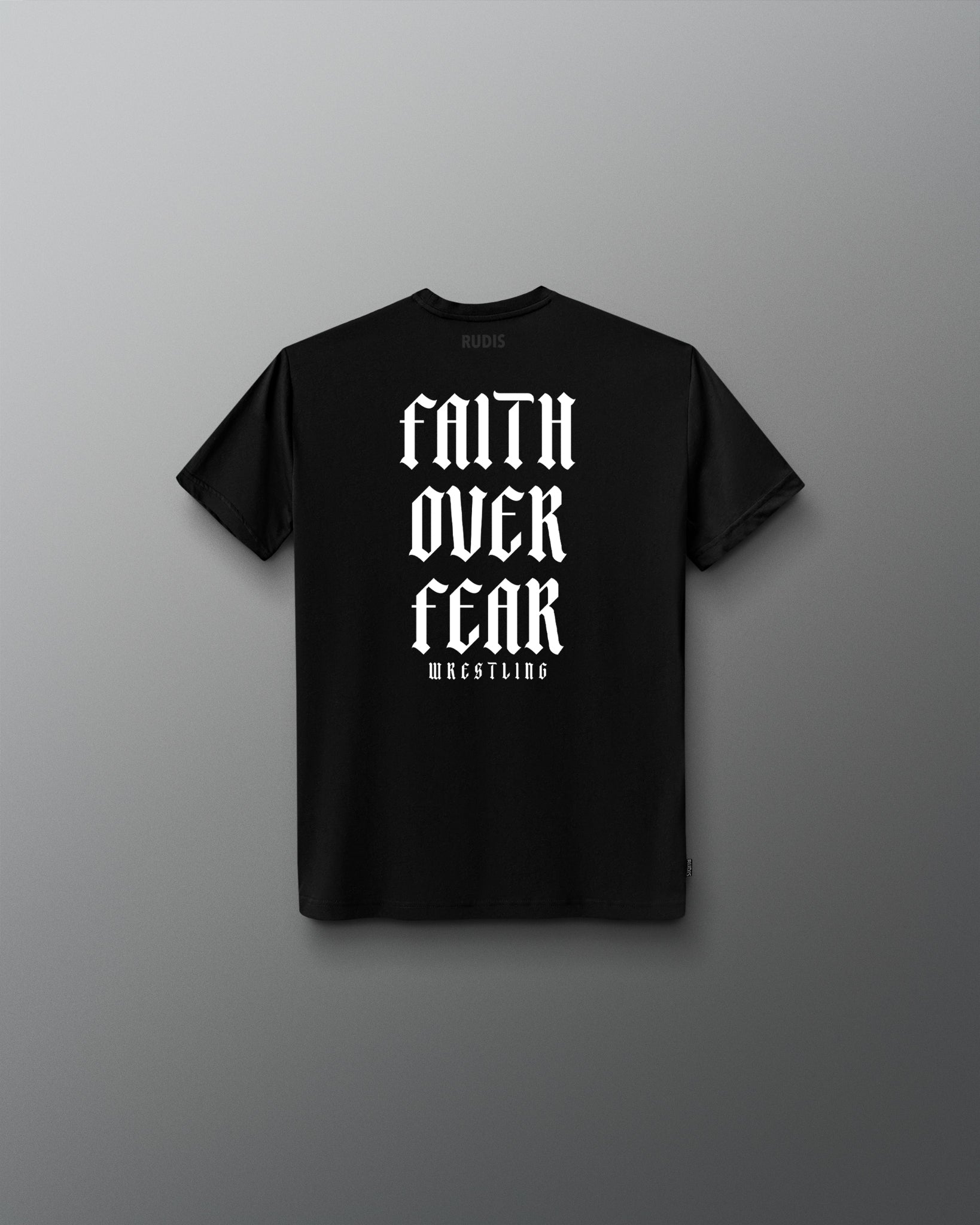 Back view of a black T-shirt featuring bold white gothic-style text that reads ‘Faith Over Fear Wrestling’ stacked vertically.