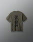 Green shirt with 'RUDIS' branding on the back against a gray background