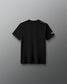 Black t-shirt with branding on a gray background