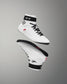 White wrestling shoes with black accents on a gray background