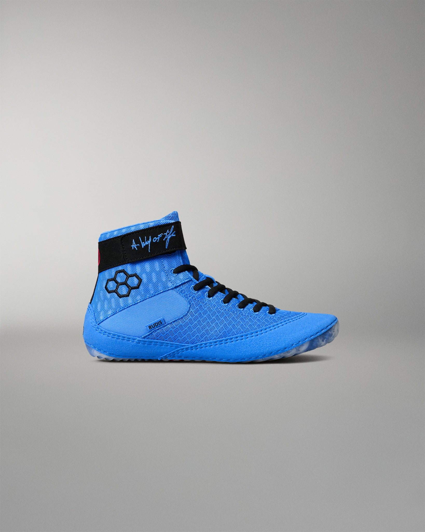 Side profile of RUDIS Samurai Speed Ikigai youth wrestling shoe featuring blue mesh construction, black laces, ankle strap, and RUDIS branding.