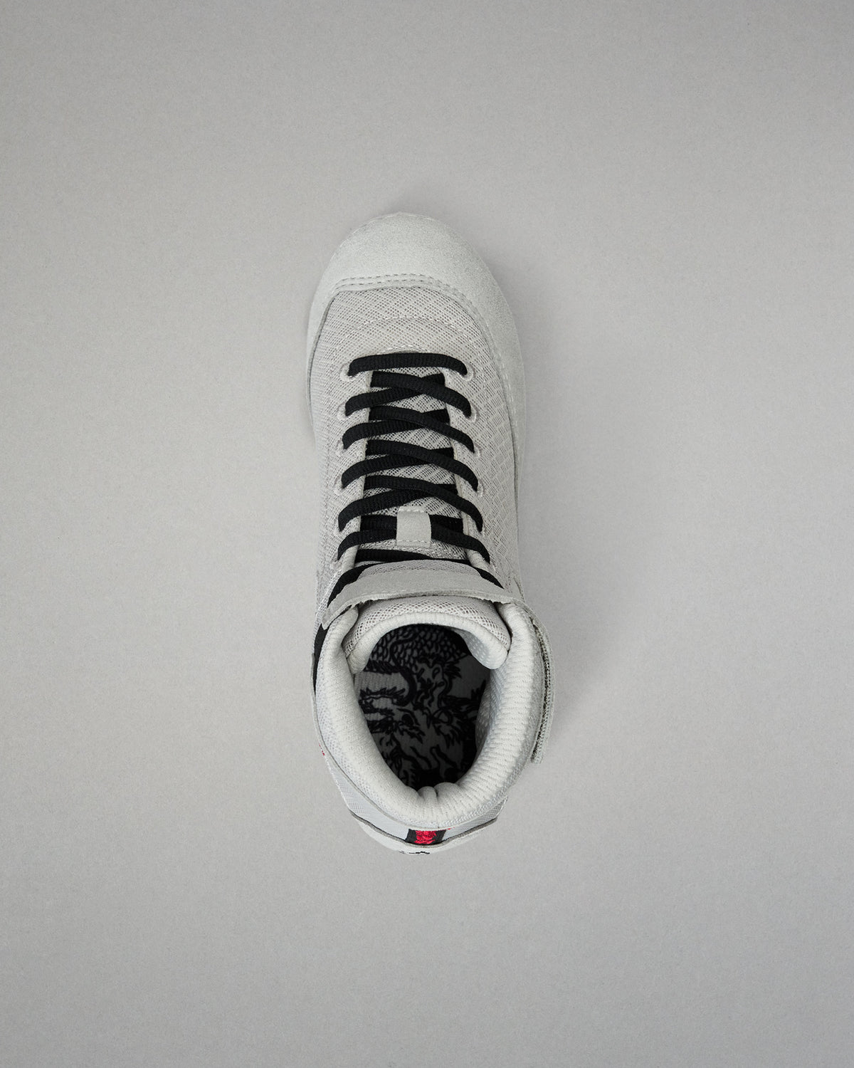 Top-down view of the RUDIS Samurai Speed Youth Kokoro wrestling shoe, showing black laces, padded gray ankle collar, mesh upper, and detailed interior footbed artwork.