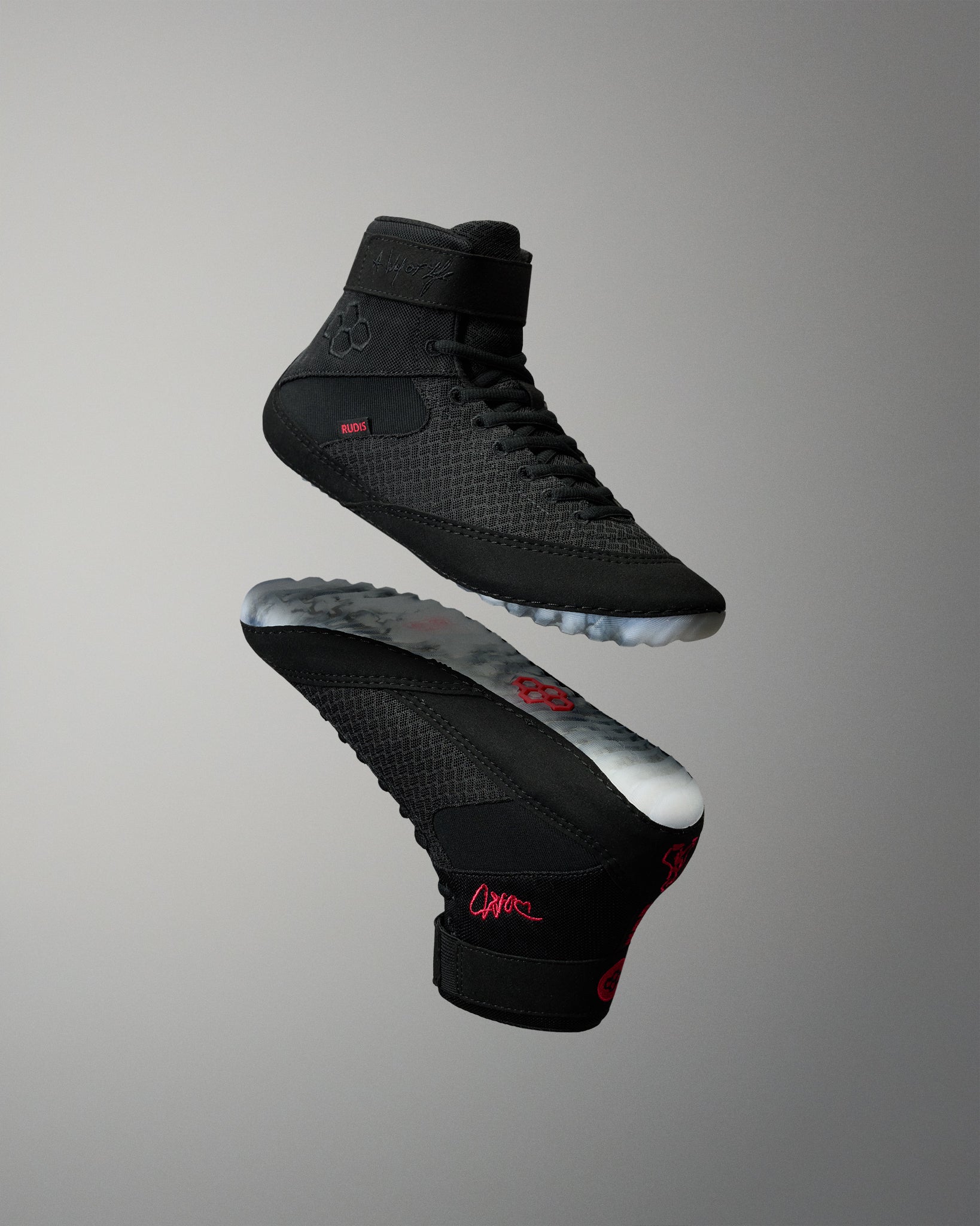 RUDIS Samurai Speed Youth Wabi-Sabi wrestling shoes in a floating product display, highlighting black mesh uppers, ankle straps, red details, and illustrated translucent outsoles.