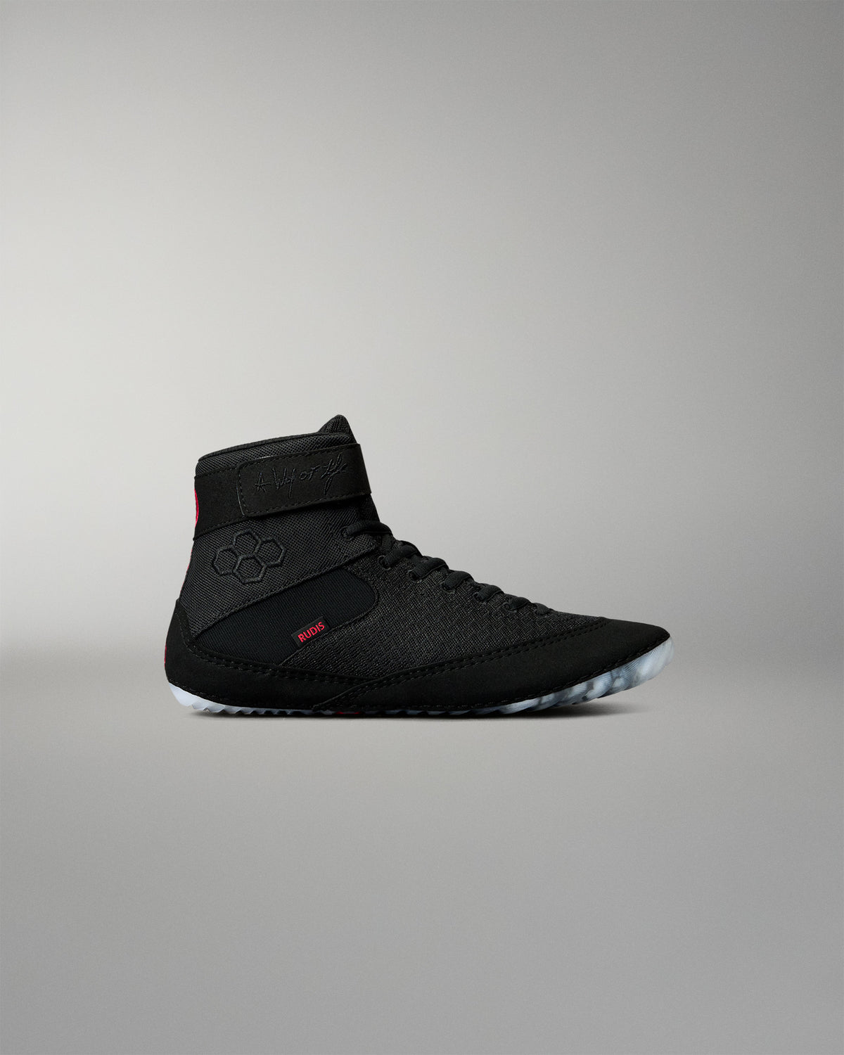 Side profile of the RUDIS Samurai Speed Youth Wrestling Shoe in Wabi-Sabi black, featuring a textured mesh upper, lace-up closure, ankle strap, and translucent outsole.