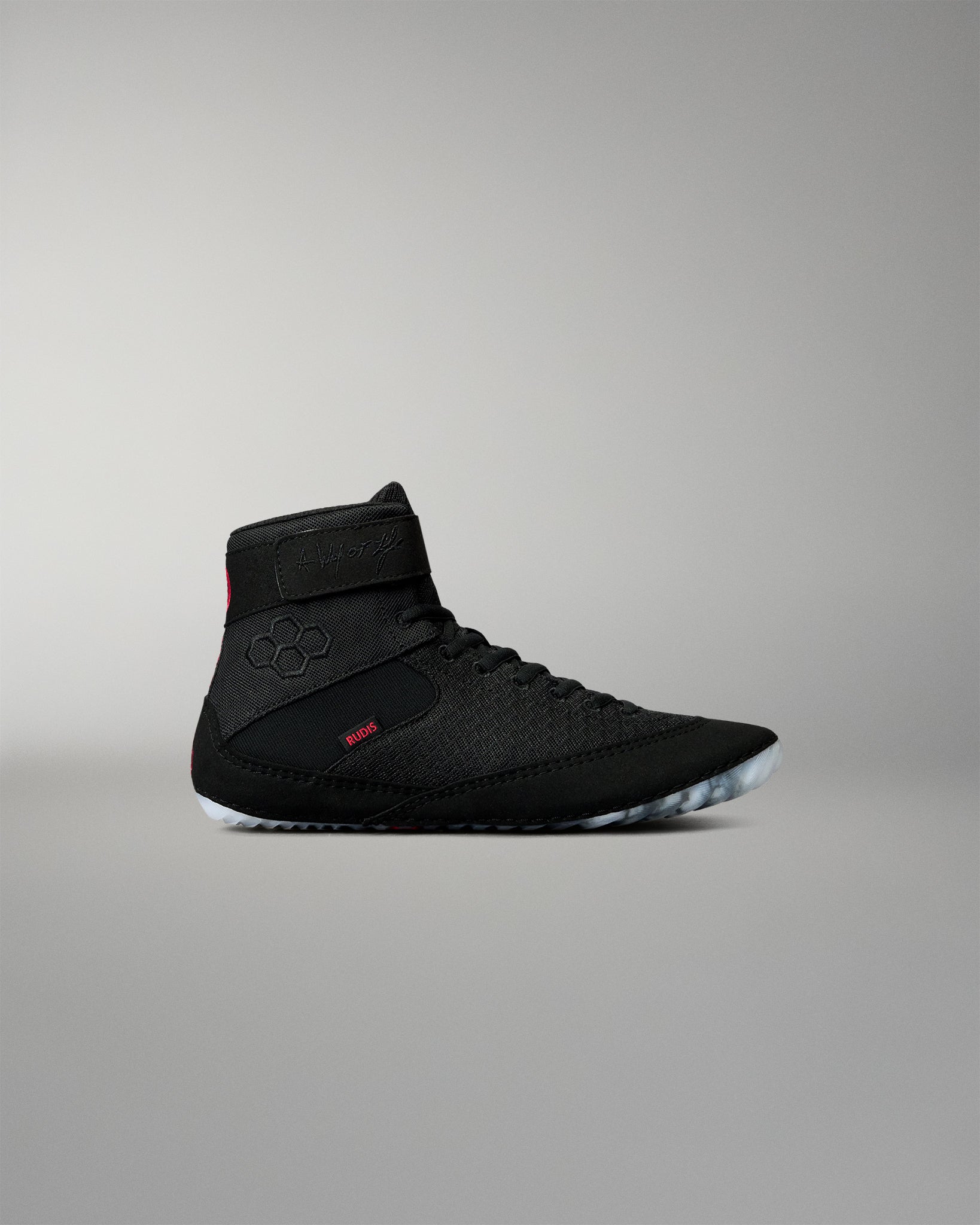 Side profile of the RUDIS Samurai Speed Youth Wrestling Shoe in Wabi-Sabi black, featuring a textured mesh upper, lace-up closure, ankle strap, and translucent outsole.