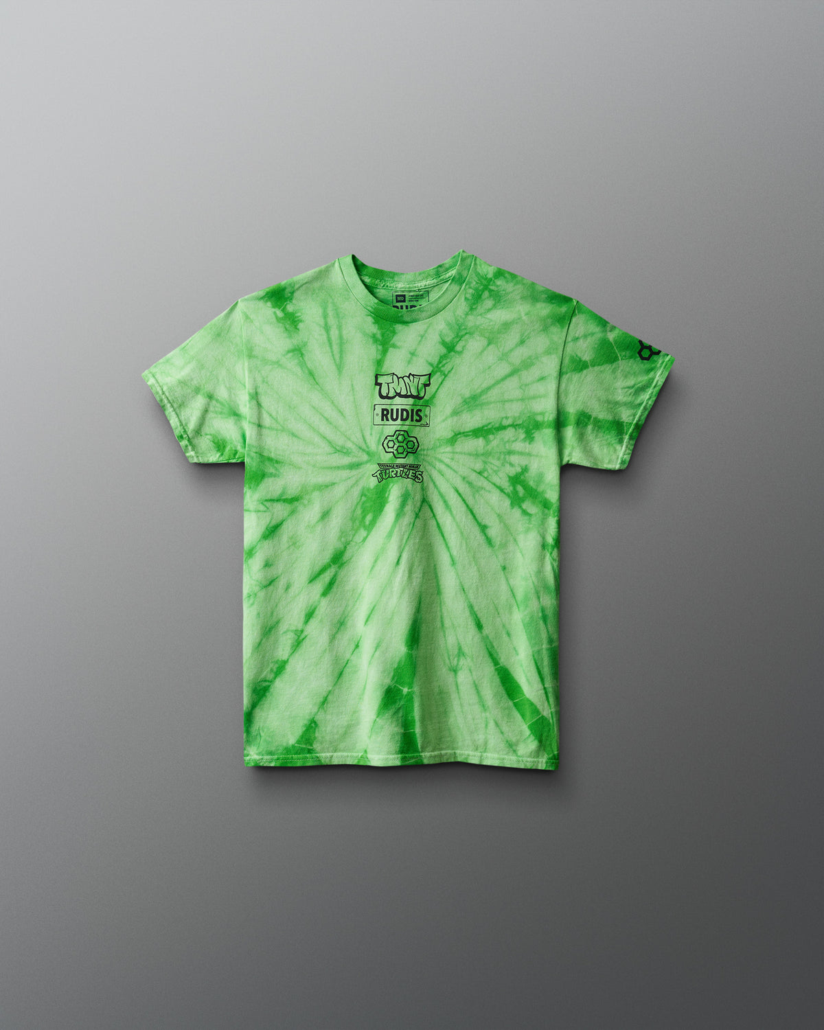 Green tie-dye t-shirt with a logo on a gray background. TMNT. Teenage Mutant Ninja Turtles