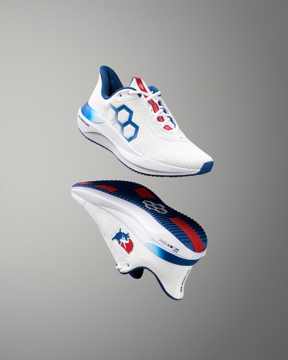 White running shoe with blue and red accents on a gray background