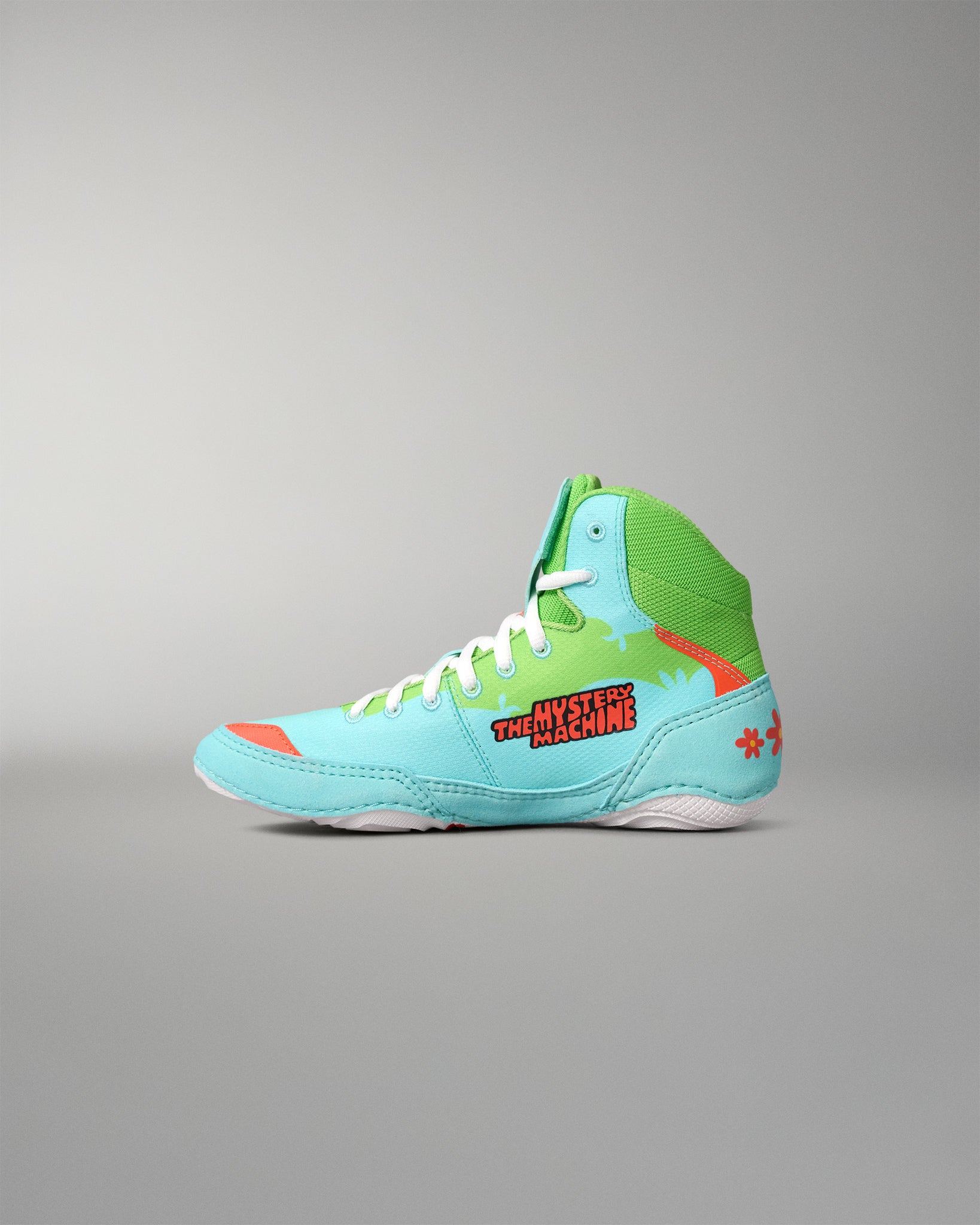 RUDIS Scooby-Doo Colt 4.0 youth wrestling shoe inner side view with The Mystery Machine lettering, turquoise and green panels, white laces, and orange floral accents.