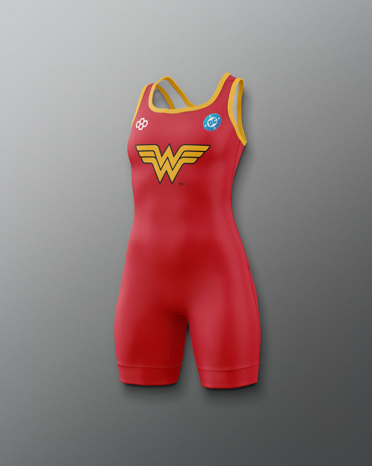 RUDIS Wonder Woman Logo Girls' Elite 2.0 Wrestling Singlet in red with yellow trim, iconic gold Wonder Woman chest emblem, DC Comics logo and fitted athletic silhouette.