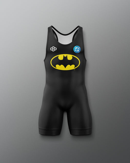 Front view of the black RUDIS Batman Logo Youth Elite 2.0 wrestling singlet featuring the yellow Batman logo, DC emblem, and RUDIS mark.