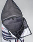 An open white and navy blue duffel bag showcasing multiple compartments and a mesh pocket designed for efficient organization and travel comfort