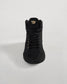 A stylish black high-top sneaker featuring a breathable mesh upper gold accents and a textured sole designed for performance and comfort